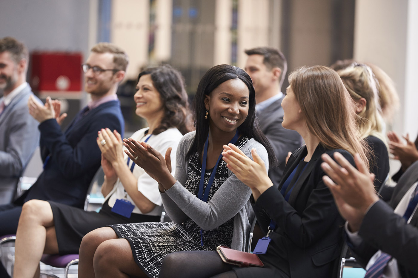 Audience Applauding Speaker After Conference Presentation