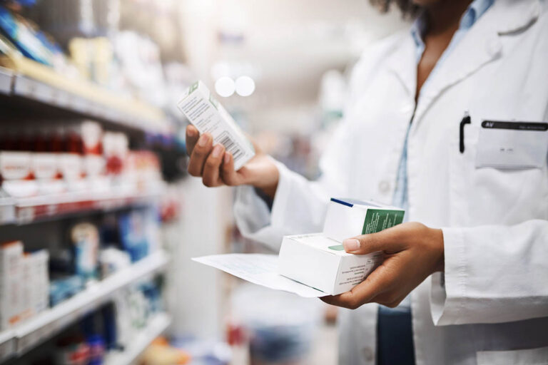 woman researches emerging rx trends in the pharmacy aisle |Corporate Synergies