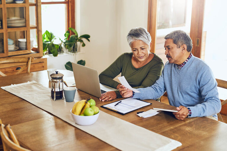 Retirement-age employees discuss how their retirement will affect their finances. | Corporate Synergies