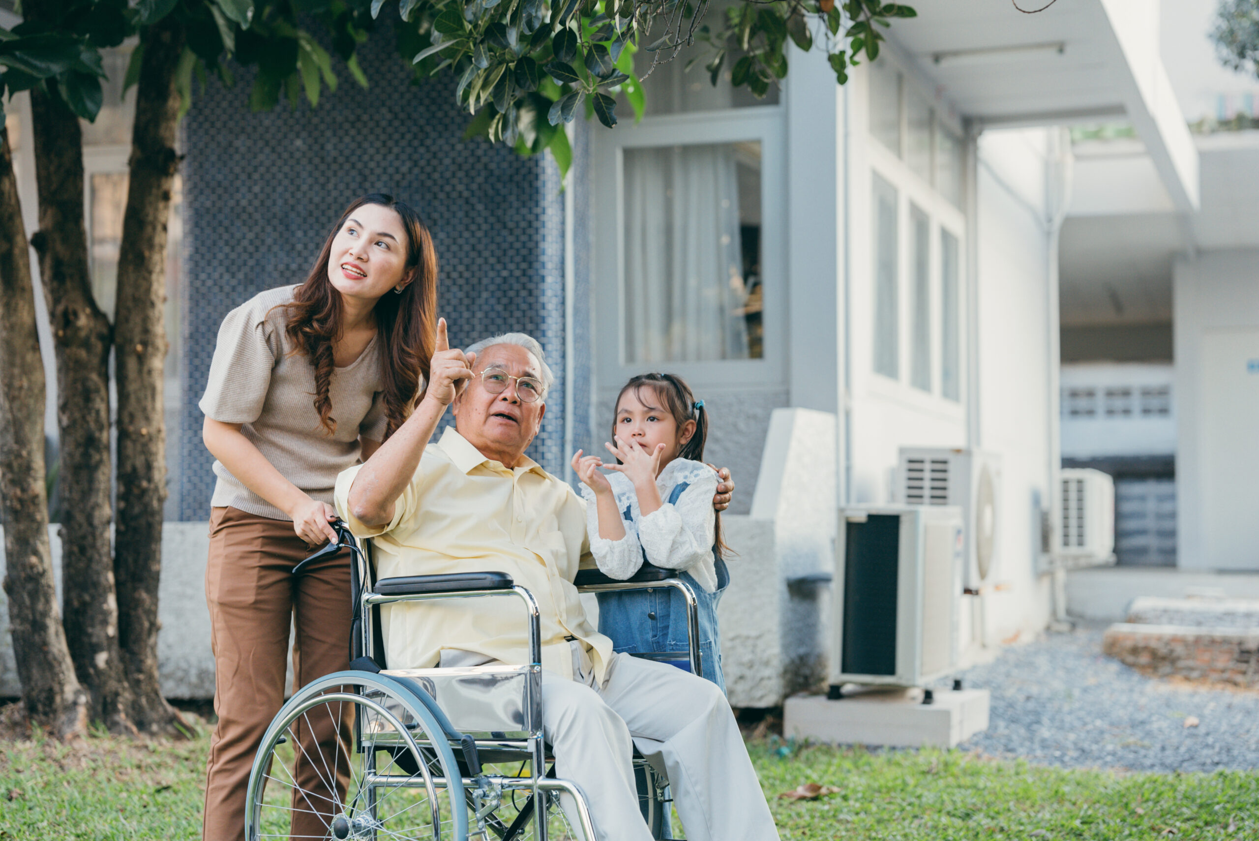 Caregiving benefits would help this Asian woman care for her wheelchair-bound father and daughter. |Corporate Synergies